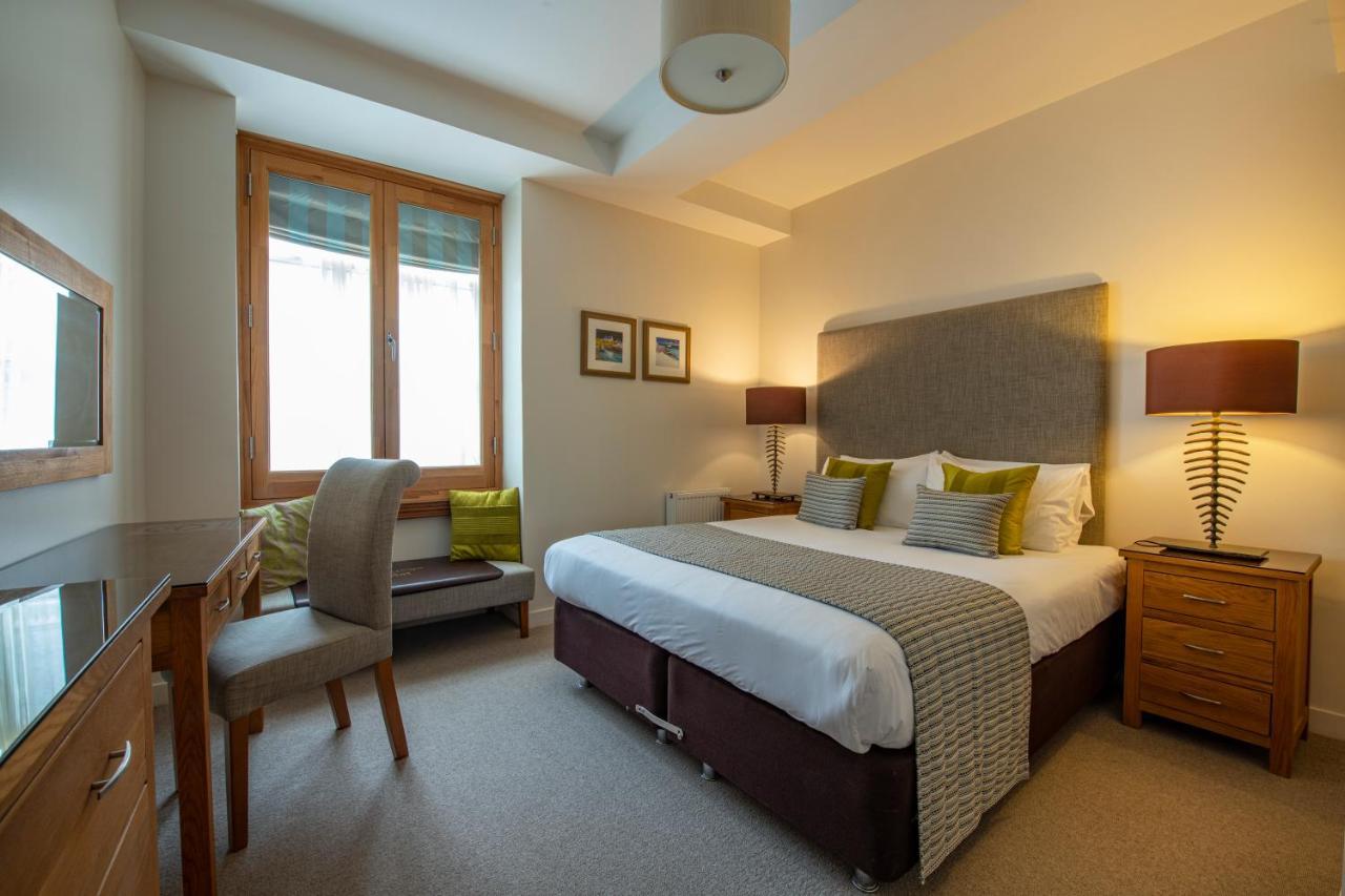 Inverness City Suites Exteriör bild