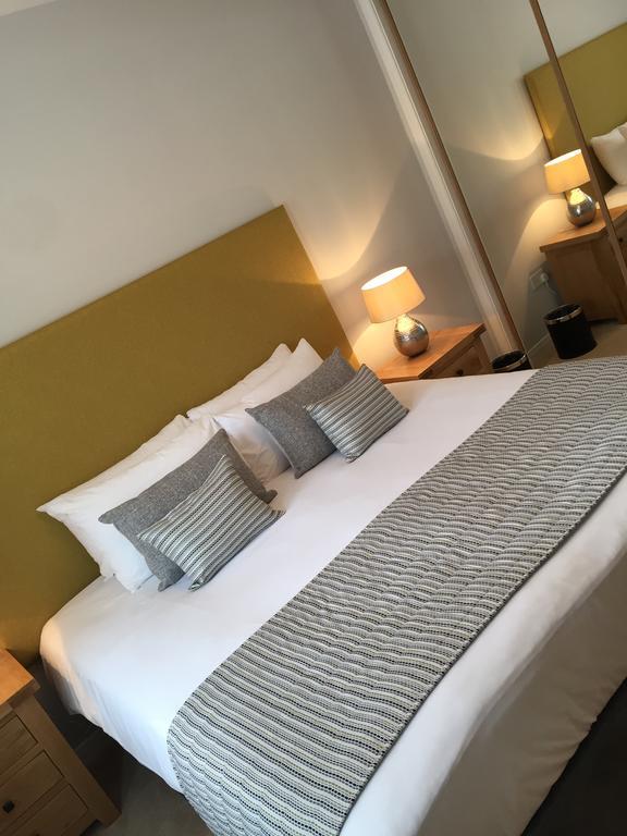 Inverness City Suites Rum bild